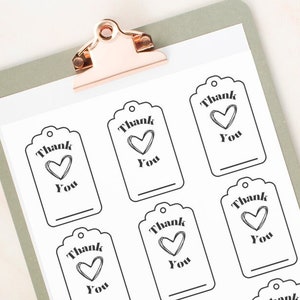 May include: Printable gift tags with a simple design featuring a heart and the text "Thank You".