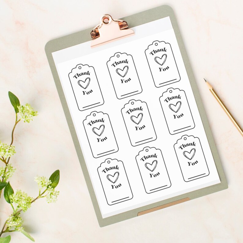 May include: Printable gift tags with a simple design featuring a heart and the text "Thank You".