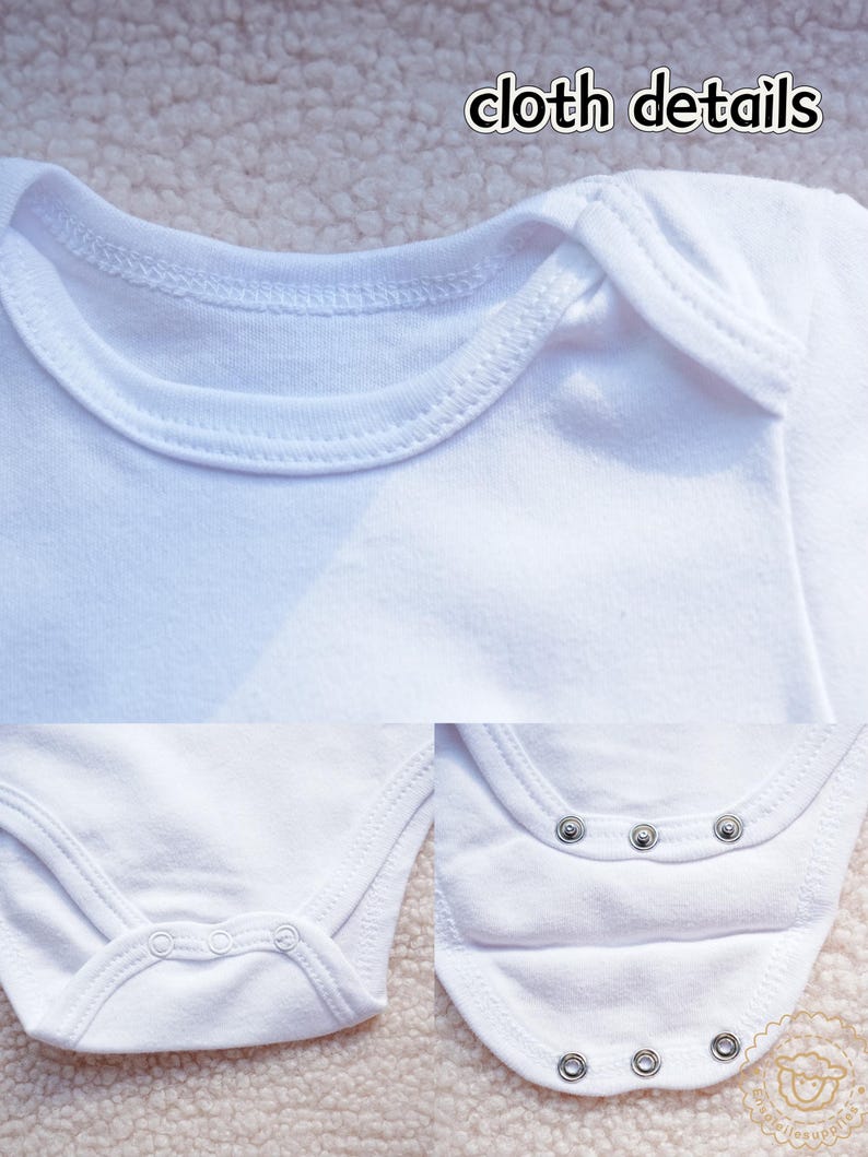 May include: Close-up of a white baby onesie with the text "cloth details". The onesie has a round neckline, snap closures at the bottom, and detailed stitching. The fabric looks soft and comfortable.