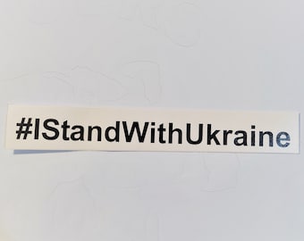 Może przedstawiać: Białe tło z czarno-białą naklejką z napisem "#IStandWithUkraine".