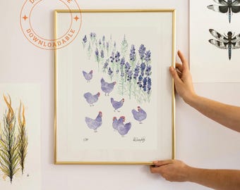 May include: A framed watercolor print featuring lavender flowers and several purple chickens. The artwork is in a gold frame and includes the text "DIGITAL FILE DOWNLOADABLE" in a circular design. Additional artwork is visible on the wall.