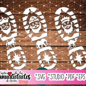 Puede incluir: Diseños recortados en blanco de los Reyes Magos, cada uno con corona, barba y animal. Los diseños incluyen un caballo, un elefante y un camello. La imagen también incluye el texto "la Casita de las manualidades de Dorita Etsy" y extensiones de tipo de archivo.