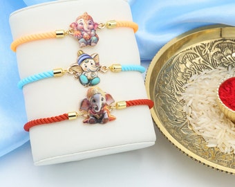 UtsaWe Rakhi | Adorable Ganesha Rakhis avec Roli Chawal - Célébrez le Raksha Bandhan avec style et tradition, parfait pour les frères de tous âges