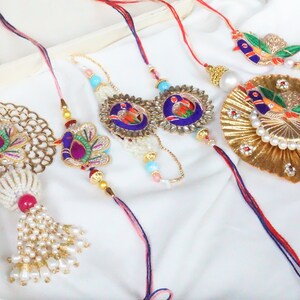 UtsaWe Rakhi | Cute Bhaiya Bhabhi Lumba RAKHI Crafted W/  Beautiful Beads  + Roli and Chaval |Rakhi set |Designer Rakhi | Couple Rakhi