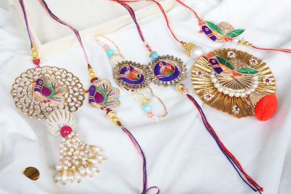 UtseWe Rakhi | Designer Bhaiya Bhabhi Lumba Rakhi with Roli and Chawal