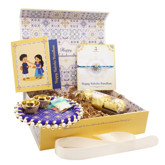 UtseWe Classic Rakhi Gift Box for All Ages Includes Roli-Chawal, Thali, Card & Choco