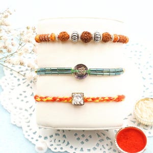 UtsaWe Rakhi | Minimalistyczna, pełna znaczenia i wykonana z miłości Pojedyncza Rakhi | Zestaw Rakhi | Designerska Rakhi | Dewocyjna Rakhi | Urocza Rakhri