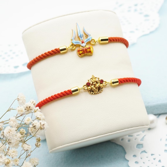 UtseWe Divine Rakhi Bracelet for Adults | Adjustable Cord Bracelet | Includes Roli Chawal