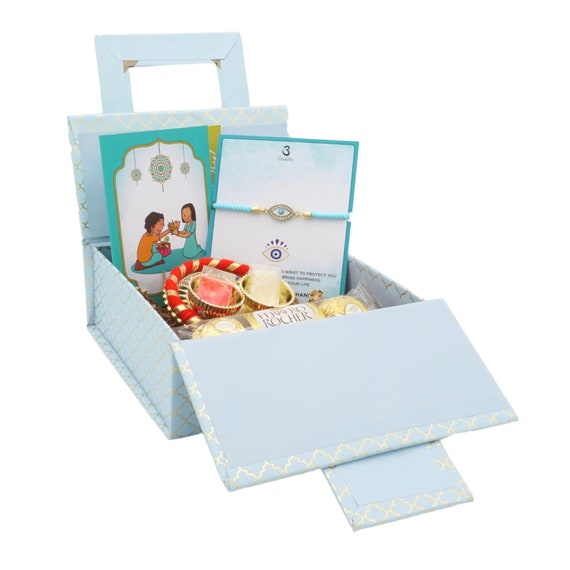 UtseWe Evil Eye Rakhi Gift Hamper with Roli-Chawal, Choco, Thali, & Card | Rakhri Gift Box