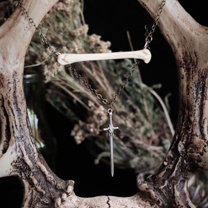 Coyote Bone Choker: Real Bone Necklace with Silver Sword Pendant
