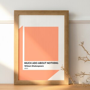May include: A framed print with a peach colored background and white text. The text reads "Much Ado About Nothing" by William Shakespeare, 1600.