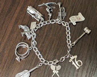 Vintage Sterling Silver Charm Bracelet with 10 Charms