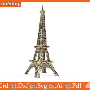 Puede incluir: Un modelo detallado de la Torre Eiffel, un famoso monumento en Par&iacute;s, Francia, cortado con l&aacute;ser. El modelo est&aacute; hecho de madera y est&aacute; listo para ser ensamblado. El modelo se muestra sobre un fondo blanco.