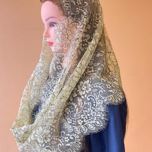 Elegant vintage-inspired French lace infinity chapel mantilla veil, perfect for Mass. Soft, lightweight, and timelessly beautiful.