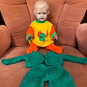 Antique Doll with Outfits