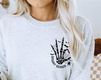 Spooky Season Pocket Sweater, spooky vibes, Halloween skeleton pocket sweater, stay spooky, goth hoodie, got shirt, spooky pocket hoodie