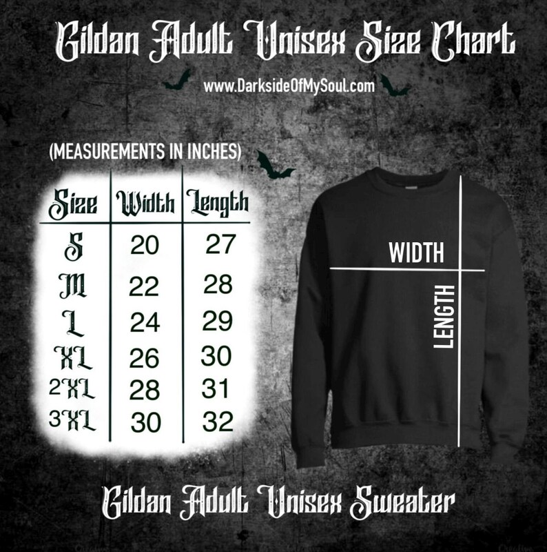 May include: A black Gildan adult unisex sweatshirt size chart with measurements in inches. The chart shows the width and length of the sweatshirt in inches for sizes S, M, L, XL, 2XL, and 3XL.