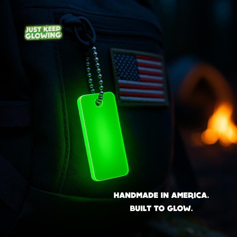Handmade in America glow in the dark keychain on rugged backpack – premium survival gear made in USA.