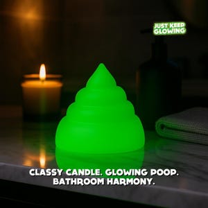 Glow in the dark poop toy on luxury bathroom counter as funny novelty decor and night light