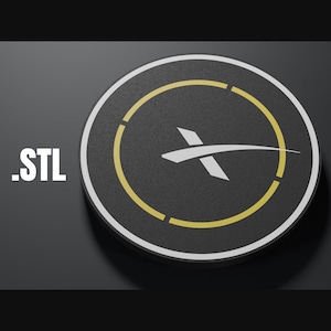 May include: A black and gold circular logo with a white stylized letter X and a curved line. The logo is on a black background and has the text .STL.