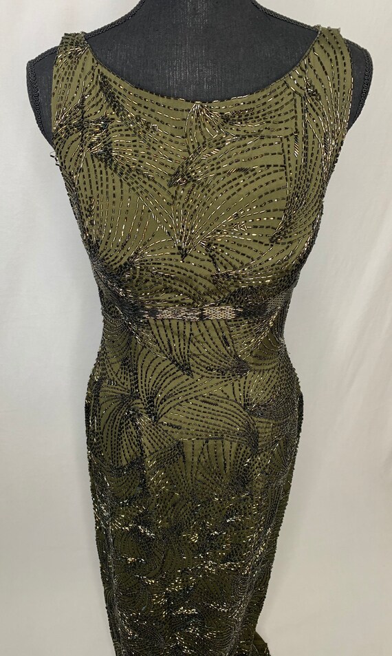 Green vintage women’s beaded gown