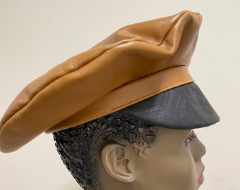 Over size Tan leather beret with black leather brim Hd Sz 23”