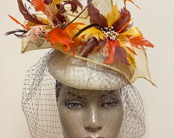 Cream fine weave straw Fascinator with large handmade feather flower and veiling.#14KA