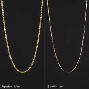 May include: Two gold chains on a black background. The chain on the left is a rope chain, 1.5 mm thick. The chain on the right is a box chain, 1 mm thick.