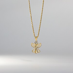 May include: A gold chain necklace with a small angel pendant. The angel is detailed with a halo and wings.