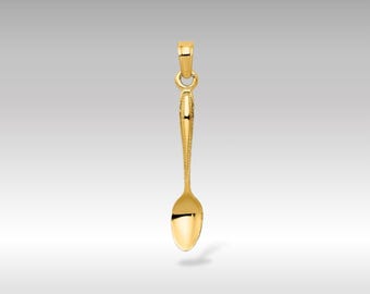 May include: A gold spoon charm pendant. The spoon has a rounded bowl and a detailed handle.