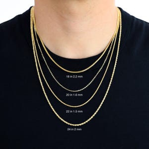 May include: Four gold rope chains of different lengths and thicknesses. The chains are 18 inches, 20 inches, 22 inches, and 24 inches long. The chain thicknesses are 2.2 mm, 1.6 mm, 1.5 mm, and 2 mm.