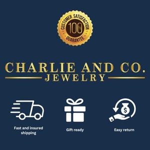 May include: A gold logo with the text "Customer Satisfaction Guarantee 100%" and the text "Charlie and Co. Jewelry" below it.  Three icons are below the text: a delivery truck, a gift box, and a money bag with an arrow circling it.  The text "Fast and insured shipping", "Gift ready", and "Easy return" are below the icons.