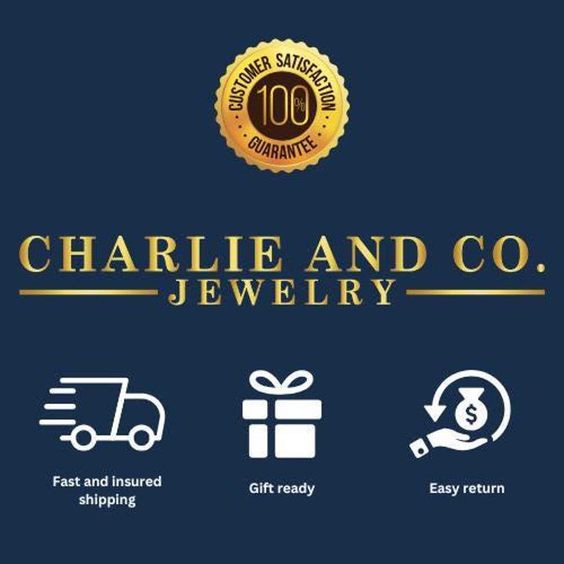 May include: A gold logo with the text "Customer Satisfaction Guarantee 100%" and the text "Charlie and Co. Jewelry" below it.  Three icons are below the text: a delivery truck, a gift box, and a money bag with an arrow circling it.  The text "Fast and insured shipping", "Gift ready", and "Easy return" are below the icons.