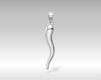 May include: A silver charm in the shape of a horn, a traditional Italian good luck charm.