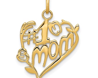 May include: A gold-colored pendant in the shape of a heart, with the words "#1 Mom" cut out. The pendant has a loop at the top for a chain and is decorated with floral accents. The design is intricate and detailed.