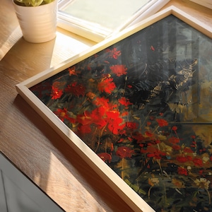 Framed artwork inspired by Elden Ring, featuring dark armor among vibrant red flowers against a moody, atmospheric background. Perfect for fans of fantasy and dark art, capturing the game's haunting beauty and contrast of life and decay.
