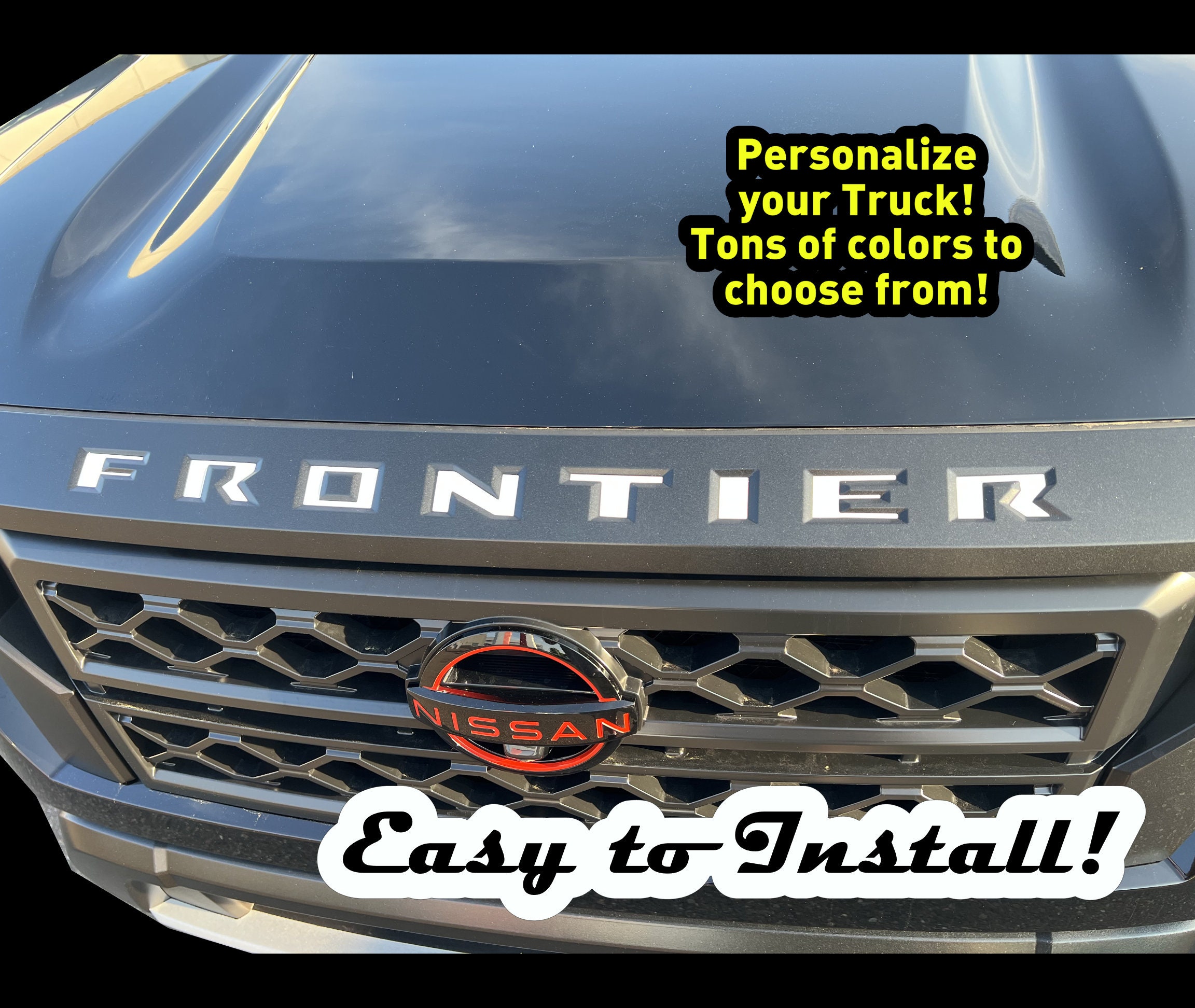 thumbnail image 2 of OEM Nissan Front Grille Emblem Logo W/ Camera Hole – Fits 2022-2025 Nissan Frontier, New Genuine 2 of 3