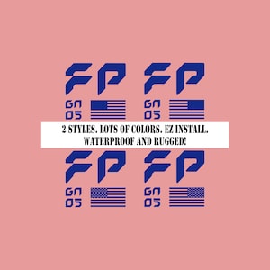 May include: A pink background with four sets of blue graphics. Each set includes the letters "FP", the letters "GN" and the number "05", and an American flag. The text "2 STYLES. LOTS OF COLORS. EZ INSTALL. WATERPROOF AND RUGGED!" is in a white rectangle.