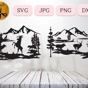 May include: Black and white silhouette design of a mountain scene with a moose, deer, and wolves. The design includes trees and a mountain range in the background.