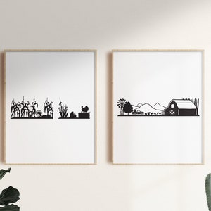 Op de afbeelding: Twee zwart-witte silhouetprints van boerderijsc&egrave;nes. De eerste print toont een ma&iuml;sveld, een kalkoen en een hooibaal. De tweede print toont een schuur, een windmolen en een veld met bergen op de achtergrond.