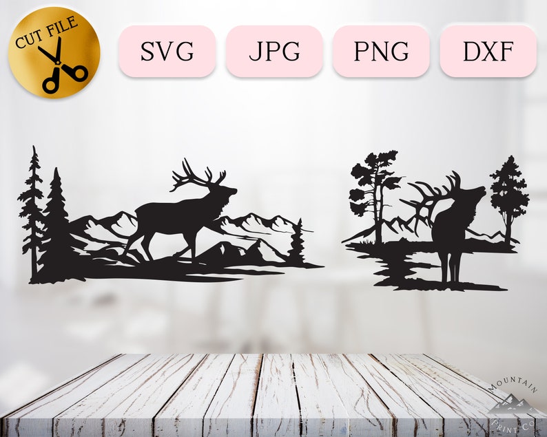May include: Two black silhouette designs of an elk standing in a mountain landscape. The first design shows the elk walking to the right, while the second design shows the elk standing still. Both designs feature trees and mountains in the background.