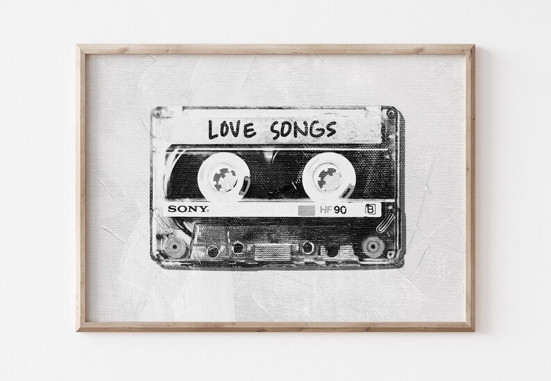 May include: Black and white illustration of a cassette tape with the words "LOVE SONGS" printed on the label. The cassette tape is a Sony brand and says "HF 90" on the side.