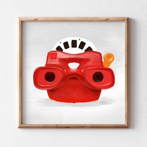 Könnte beinhalten: Ein rotes Plastik-View-Master-Spielzeug mit einer schwarz-weißen Filmrolle. Das Spielzeug hat zwei rote Linsen und einen gelben Griff.