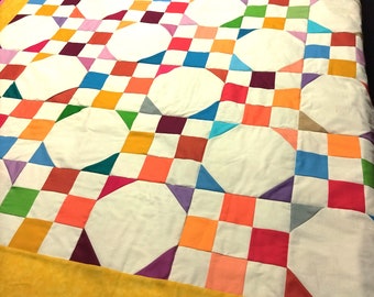 Charming Snowball Quilt ideal for a baby's crib or a youth bed