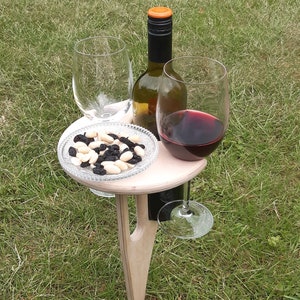 Portable Wine table perfect for wine lovers to enjoy a glass outdoors