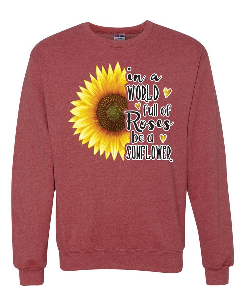 In A World Full Of Roses Be A Sunflower Pop Culture Unisex Crewneck Graphic Sweatshirt