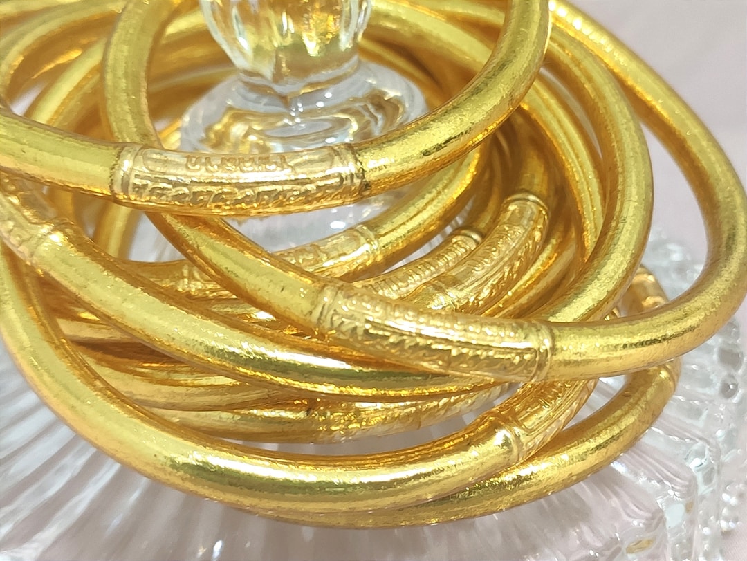 Tibetan gold best sale bangles