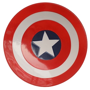 May include: A circular shield featuring a concentric design with a wide red outer ring, a white middle ring, and a dark blue center circle containing a large, five-pointed white star. The surface has a smooth, glossy finish throughout the entire object.