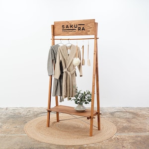 Portable wooden garment rack VR-02-CF with custom logo board | pop up store