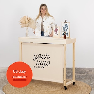 Vendor table VC-04-C-W-NT with branded panel and castor wheels, portable, for trade fairs and events